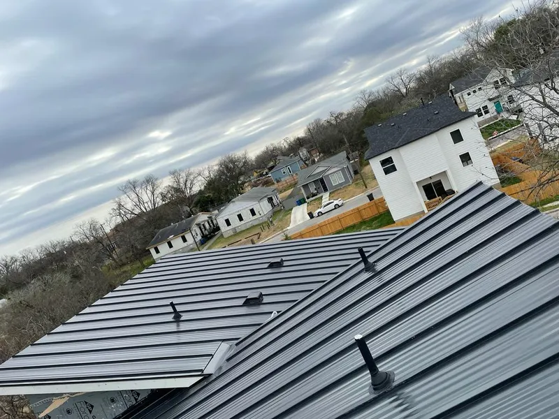Standing seam metal roof panels with vents for Skylight Repair in Gardiner